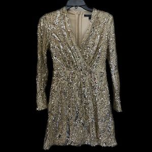 Size Women's US 4. Beautiful gold and silver sequence. Excellent condition!